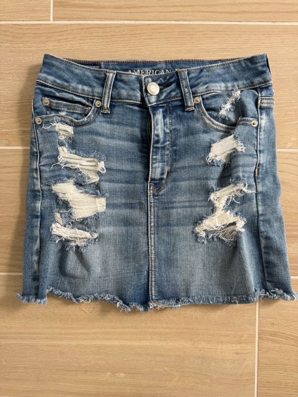 American Eagle Outfitters Light Blue Distressed Denim Mini Skirt